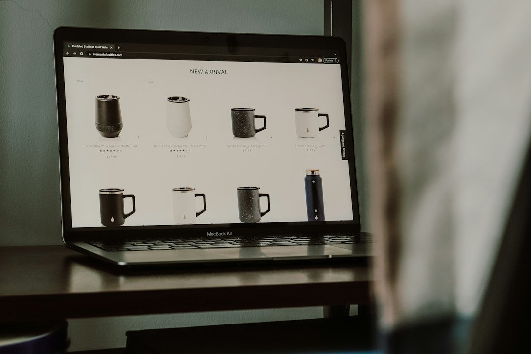 a laptop with a display of coffee mugs on the screen